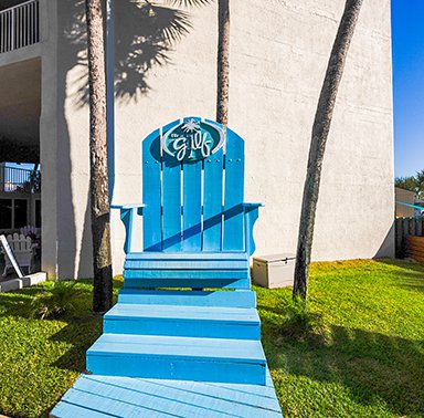 Resorts https://emeraldbeachproperties.icnd-cdn.com/images/resorts/Top of the Gulf Chair.jpg